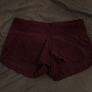Burgundy lululemon speed shorts 2.5”